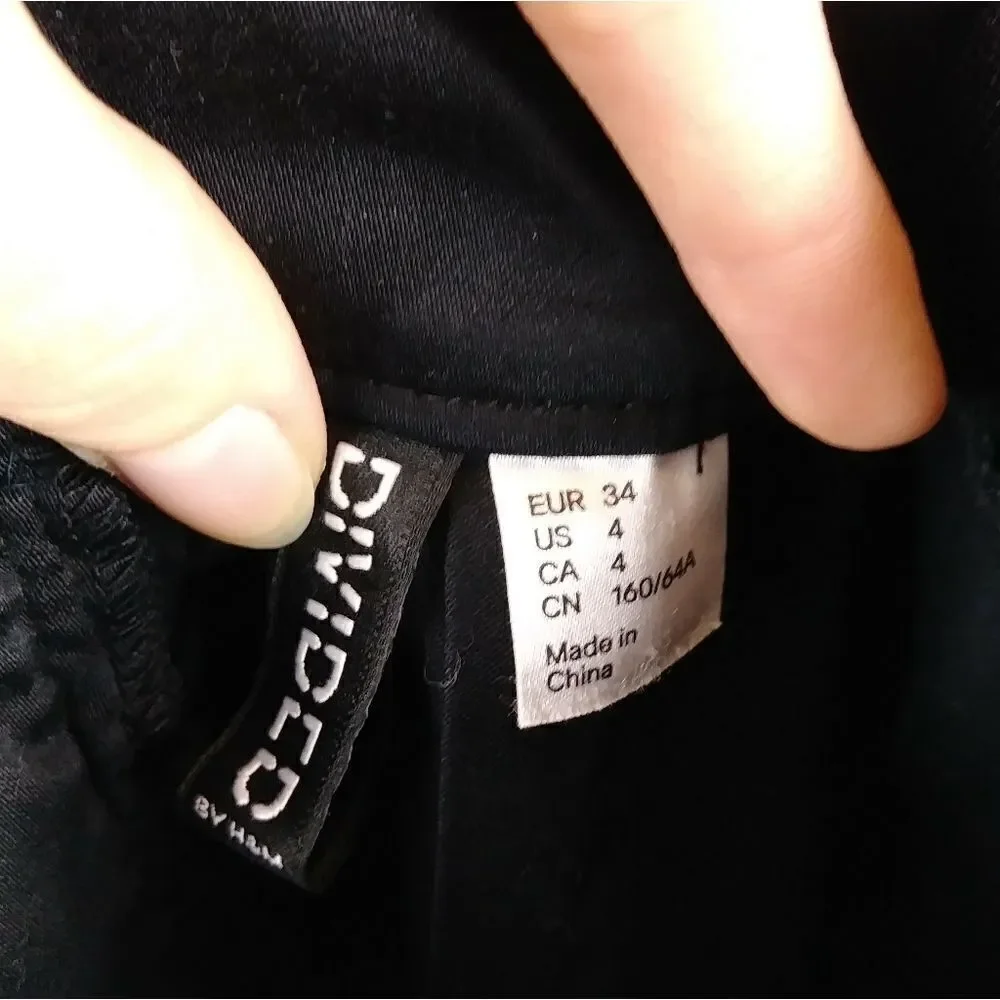 H&M Black High Waisted Peplum Mini Skirt